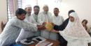 প্রয়াত শিক্ষককের পরিবারকে কল্যাণ তহবিলের অর্থ প্রদান